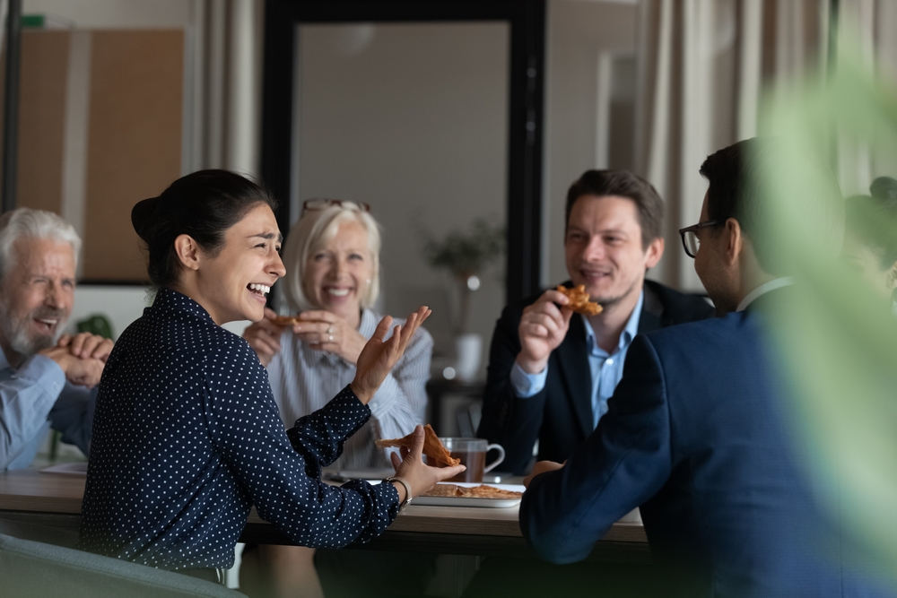 company employees sharing corporate lunch
