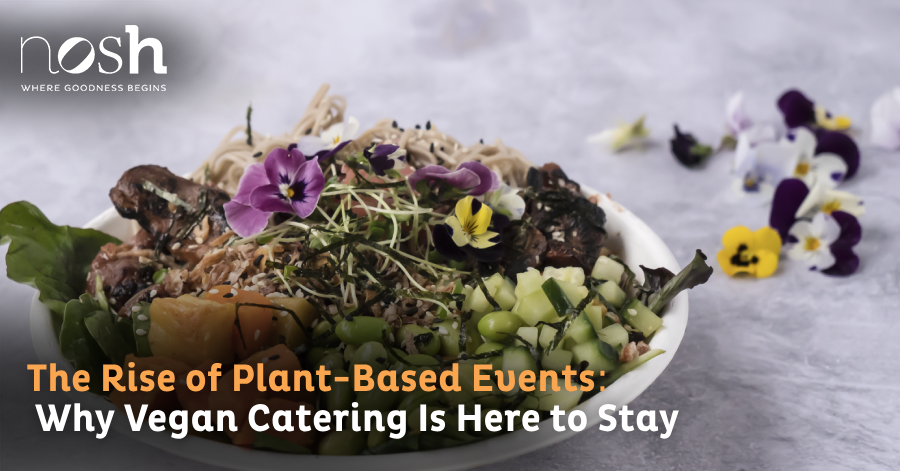 Chef garnishing plant-based dishes with fresh herbs during event preparation